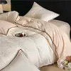 Juego de ropa de cama de cuatro piezas de jacquard de algodón puro con borde de concha de lujo, juego de ropa de cama para el hogar de tres piezas con sábana bajera de color liso para cama matrimonial