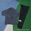 Traje de Otoño e Invierno 2025 Nuevo Pantalones de Seda Helada de Secado Rápido Chaqueta Deportiva Casual con Cremallera y Capucha Ropa de Protección Solar para Hombres y Mujeres Tendencia