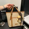 Bolsa Transfronteriza de Gran Capacidad para Mujer Otoño 2026 Nuevo Versátil Moda Hombro Único Tendencia Viaje de Negocios Retro Casual Bolsa de Mano