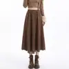 Nueva falda de gamuza tallada con láser para otoño e invierno, falda midi irregular hueca, falda larga vintage para mujer