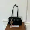 Bolsa de camurça transfronteiriça para mulheres, grande capacidade, nova bolsa versátil de ombro/axila para o outono de 2026, bolsa de trabalho vintage