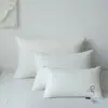 Tela de algodón Clase A núcleo de almohada antiácaros niños estudiante adulto almohada núcleo de almohada de hotel al por mayor