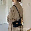 Bolso de Hombro de Diseño Vintage de Nicho Temporada Otoño 2026 Nuevo Bolso Baguette de Color Sólido de Moda para Mujer Bolso de Hombro Casual a la Moda