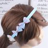 Fabricantes de Yiwu moda coreana lindo temperamento niñas diadema de lazo para bebé mercado nocturno joyas populares al por mayor