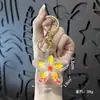 Chaveiro Estilo Ins Flor Transparente com Glitter Pingente Fofo Romântico Flor de Cerejeira Decoração de Bolsa Pequeno Presente Venda por Atacado