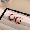 Pendientes de Tornillo Retorcidos Esmaltados con Goteo de Aceite Estilo Coreano Chapados en Oro Cobre para Mujer, Nuevos Pendientes de Botón de Moda Trendy de Lujo Ligero de Nicho con Temperamento
