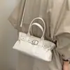 Bolsa retrô de alta qualidade para mulheres, nova bolsa de ombro única de nicho para o verão de 2026, grande capacidade, para o trabalho, transversal, bolsa de mão