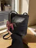 Bolso Retro de Estampado de Leopardo de Gran Capacidad para Mujer Otoño e Invierno 2025 Nuevo Bolso de Hombro de Moda Bolso Cubo de Textura de Alta Calidad