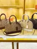 Bolso de Hombro Vintage Nueva Moda Otoño/Invierno 2026 para Mujer con Monograma Bolso Versátil Estilo Europeo y Americano Forma de Concha Personalidad Única