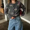 Cárdigan de punto jacquard estilo pastoral transfronterizo 2026 otoño e invierno cuello redondo estilo casual cárdigan de punto grueso para mujer
