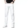 Jeans blancos de alta gama para hombre, nuevos pantalones rectos ajustados de otoño, pantalones largos elásticos casuales de moda para hombre, nuevo estilo