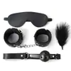 Juguetes sexuales set de bondage SM antifaz, bola de mordaza, esposas, varita de plumas simple set de cuatro piezas productos sexuales para adultos al por mayor