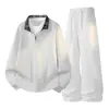 Novo conjunto casual de outono e inverno para homens, feito de algodão chinês, 320g, inclui uma blusa de moletom com meio zíper e gola virada, e calças esportivas compridas.