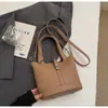 Bolso Cubo de Nicho Estilo Coreano para Mujer Nuevo Modelo 2026 con Acabado de Alta Gama, Bolso de Mano Sencillo con Patrón de Lichi, Bolso de Hombro y Cruzado de Lujo Ligero