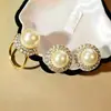 Pendientes de perlas de circón flash lujo ligero anillo de perlas ajustable cuentas de concha moda para ir al trabajo Joker traje mujer al por mayor