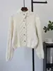Chaqueta suéter de punto trenzado estilo retro europeo y americano con cuello alto, nuevo modelo otoño e invierno 2026, cárdigan de punto de alta gama y elegante para mujer