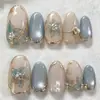 30 Piezas Venta Caliente Transfronteriza Uñas Azules Francesas Chapadas en Oro Cortas Usables Manicura Blanqueamiento Temperamento Hielo Translúcido Manicura Hecha a Mano