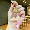 Llavero Creativo Serie Océano Relleno de Aceite Pez Payaso Estrella de Mar Pez Pequeño Colgante de Bolso Decoración de Llavero