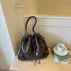 Shuai Mi Home Bolso Cubo de Moda Coreana con Cordón Simple 2026 Nuevo Nicho de Moda de Alto Valor Bolso de Hombro
