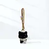 Bufanda Linda de Dibujos Animados Amarilla y Blanca Llavero de Gato Negro Pequeño Cordón Colgante para Bolsa Regalo Creativo Decoración Accesorio