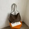 Bolsa de Pelúcia Camurça Fosca Cor Sólida Feminina Nova Outono/Inverno 2026 Simples Retrô Bolsa de Ombro Única Casual para o Dia a Dia Bolsa Transversal