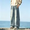 Vaqueros retro desgastados para hombre con vibra de calle americana, primavera y otoño, corte holgado, color liso, corte recto, ligeramente acampanado, adelgazantes, pantalones largos modernos