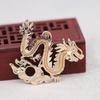 Yiwu hilo dorado color que se conserva chapado en oro DIY Tenglong Tengyun conduciendo niebla tallado tridimensional pieza de flor grande cabeza corona de fénix 168.89