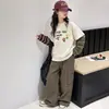 Conjunto de Niña Otoño 2026 Nuevo Estilo: Conjunto de Sudadera y Jeans Falsos de Dos Piezas para Niñas, Conjunto de Dos Piezas Estilo Coreano de Ropa de Trabajo para Estudiantes de Secundaria