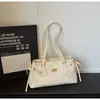 Bolsa Tote Versátil Retrô da Moda para Mulheres 2026 Primavera Nova Grande Capacidade Luxo Leve Personalizada Tendência Bolsa de Ombro/Axila