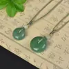 Xinjiang Golden Silk Jade Flor de Durazno Infusión Hebilla de Seguridad Colgante Colgante de Buda Colgante Marca Ping An Collar de Luna Suministro en Vivo