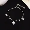 Pulsera de Flor de Cuatro Hojas de Ojo de Gato con Incrustaciones de Diamantes Chapada en Oro Real Pulsera Pequeña Fresca y Dulce Pulsera con Sensación de Diseño de Moda para Mujeres