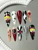 Uñas vestibles de Halloween superventas transfronterizas europeas y americanas, piezas de arte de uñas de calabaza, calavera y fantasma puramente hechas a mano, productos terminados para venta al por mayor de alta gama