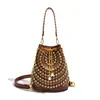 Bolso de cubo retro Y2K con tachuelas y cadena transfronterizo europeo y americano de Amazon para mujer, bandolera, bolso de nicho de alta gama con remaches