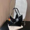 Bolso de axila para mujer, nuevo bolso tipo bola de masa de otoño 2026, de alta gama, vintage, exquisito, bolso de hombro para ir al trabajo, bolso cruzado