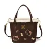 Bolso Pequeño Versátil Ligero Nuevo y Elegante 2025 para Niñas, Bolso Cruzado Hello Kitty con Estampado de Leopardo, Lindo Bolso de Mano Tipo Cubo