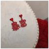 Brincos de ano novo feminino moda nacional brincos populares brincos ricos das mulheres mulheres Ano Novo bonito amor requintado estilo chinês