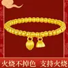 A Pulseira de Lótus Dourado de Areia Vietnamita Que Não Desbota Quando Queimada é Combinada com uma Pulseira Anel Lisa Que Tem a Mesma Cor por Dentro e por Fora