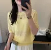 Top de Punto Calado Jacquard Europeo de Manga Corta para Mujer 2026 Verano Nuevo Único y Elegante Camiseta de Nicho