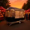 La fábrica de Shanghái produce carritos de comida con acabado espejo, cocinas móviles, carritos de bebidas frías, carritos gourmet y carritos de café