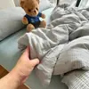 Hilo de doble capa YU ~ Juego de cuatro piezas de gasa de doble capa de grado materno e infantil Corazón de niña francesa Algodón Juego de tres piezas para dormitorio Ropa de cama