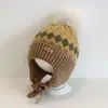 Bonitos y adorables gorros de otoño e invierno para niños, con diseño de poner, material de punto y una serie de dibujos animados, que brindan abrigo y protección para los oídos para bebés y niños pequeños.