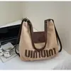 Bolsa Tote Tendência de Grande Capacidade para Mulheres Deste Ano 2026 Nova Retrô Casual Versátil Bolsa para o Dia a Dia Bolsa de Ombro de Alta Qualidade