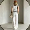 Mono de Mujer de Verano 2026 Nuevo Estilo de Vacaciones Europeo y Americano Transfronterizo Cuello en V Encaje Sin Mangas Bloque de Color Ribete Negro
