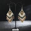 Aretes Largos de Borlas de Cuentas de Arroz Hechos a Mano Populares Europeos y Americanos Bohemia Retro Personalidad Nicho Elegantes Aretes para Vacaciones