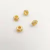 Retención de color fuerte chapado en cobre dorado microincrustaciones circonita cúbica de colores cuentas redondas cuentas planas cuentas espaciadoras huecas accesorios para joyería con cuentas de juego cultural DIY