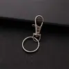 Llavero hebilla de perro hebilla de gancho giratoria llavero antirrobo para coche hebilla colgante de cinta de felpa en stock hebilla de gancho