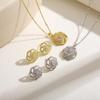 Collar de Plata Esterlina S925 con Flor de Circonita Giratoria Aretes para Mujer Nuevo Diseño con Sentido Colgante Temperamento Traje Europeo y Americano Transfronterizo