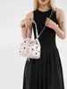 Bolso Cubo de Nicho Súper Popular Transfronterizo para Mujer 2025 Nuevo Estilo Punk Europeo y Americano Bolso Bandolera con Remaches Bolso Cruzado