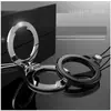 Novo modelo de suporte de telefone com cordão e suporte de anel, alça de segurança metálica para desktop dois em um, acessório de corrente com fivela para cordão de telefone