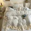 2026 Novo Conjunto de Quatro Peças Outono e Inverno Quente Leite Fleece Burnout Renda Francesa Uso Doméstico Conjunto de Quatro Peças de Inverno Espesso Macio